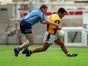 11 June 2000; Scott Doran of Wexford in action against Coman Goggins of Dublin during the Bank of Ireland Leinster Senior Football Championship Quarter-Final match between Dublin and Wexford at Croke Park in Dublin. Photo by Brendan Moran/Sportsfile