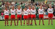13 May 2000; Tyrone players stand for the National Anthem, Amhrán na bhFiann, prior to the All-Ireland U21 Football Championship Final between Limerick and Tyrone at Cusack Park in Mullingar, Westmeath. Photo by Damien Eagers/Sportsfile