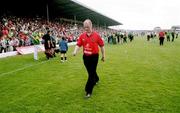 18 June 2000; Cork manager Larry Tompkins leaves the pitch following his side defeat in the Bank of Ireland Munster Senior Football Championship Semi-Final match between Kerry and Cork at Fitzgerald Stadium in Killarney, Kerry. Photo by Brendan Moran/Sportsfile