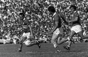 19 July 1984; Denis 'Ogie' Moran of Kerry in action against Kevin Kehilly and Tony Nation, right, of Cork during the Munster Senior Football Championship Final match between Kerry and Cork at Fitzgerald Stadium in Killarney, Kerry. Photo by Ray McManus/Sportsfile
