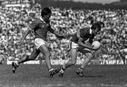 19 July 1984; John Kennedy of Kerry in action against Tony Nation of Cork during the Munster Senior Football Championship Final match between Kerry and Cork at Fitzgerald Stadium in Killarney, Kerry. Photo by Ray McManus/Sportsfile