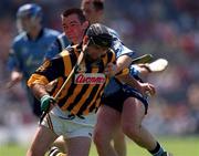 18 June 2000; DJ Carey of Kilkenny is tackled by Sean Power of Dublin during the Guinness Leinster Senior Hurling Championship Semi-Final match between Kilkenny and Dublin at Croke Park in Dublin. Photo by Ray McManus/Sportsfile