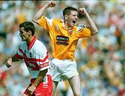 18 June 2000; Kevin Brady of Antrim celebrates after scoring his side's second goal during the Bank of Ireland Ulster Senior Football Championship Semi-Final match between Antrim and Derry at Casement Park in Derry. Photo by David Maher/Sportsfile