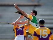 18 June 2000; Kevin Kinahan of Offaly in action against Larry Murphy of Wexford during the Guinness Leinster Senior Hurling Championship Semi-Final match between Offaly and Wexford at Croke Park in Dublin. Photo by Ray McManus/Sportsfile