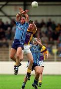 11 June 2000; Brian Stynes of Dublin in action against Tom Howlin of Wexford during the Bank of Ireland Leinster Senior Football Championship Quarter-Final match between Dublin and Wexford at Croke Park in Dublin. Photo by Brendan Moran/Sportsfile