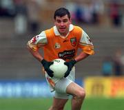 28 May 2000; John McManus of Antrim during the Bank of Ireland Ulster Senior Football Championship Quarter-Final match between Antrim and Down at Casement Park in Belfast, Antrim. Photo by David Maher/Sportsfile