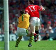 18 June 2000; Cork's Philip Clifford collides with Kerry goalkeeper Declan O'Keeffe which resulted in Clifford being given a yellow card by referee Mick Curley during the Bank of Ireland Munster Senior Football Championship Semi-Final match between Kerry and Cork at Fitzgerald Stadium in Killarney, Kerry. Photo by Brendan Moran/Sportsfile