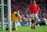 18 June 2000; Kerry goalkeeper Declan O'Keeffe reacts after a challenge by Cork's Philip Clifford, right, which resulted in the Cork player being given a yellow card by referee Mick Curley during the Bank of Ireland Munster Senior Football Championship Semi-Final match between Kerry and Cork at Fitzgerald Stadium in Killarney, Kerry. Photo by Brendan Moran/Sportsfile