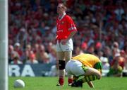18 June 2000; Kerry goalkeeper Declan O'Keeffe goes to the ground after a challenge by Cork's Philip Clifford which resulted in the Cork player being given a yellow card by referee Mick Curley during the Bank of Ireland Munster Senior Football Championship Semi-Final match between Kerry and Cork at Fitzgerald Stadium in Killarney, Kerry. Photo by Brendan Moran/Sportsfile