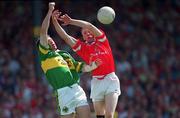 18 June 2000; Philip Clifford of Cork in action against Michael McCarthy of Kerry during the Bank of Ireland Munster Senior Football Championship Semi-Final match between Kerry and Cork at Fitzgerald Stadium in Killarney, Kerry. Photo by Brendan Moran/Sportsfile