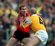 28 May 2000; Mickey Linden of Down in action against Anto Finnegan of Antrim during the Bank of Ireland Ulster Senior Football Championship Quarter-Final match between Antrim and Down at Casement Park in Belfast, Antrim. Photo by David Maher/Sportsfile