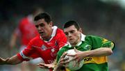 18 June 2000; Aodhan MacGearailt of Kerry in action against Martin Cronin of Cork during the Bank of Ireland Munster Senior Football Championship Semi-Final match between Kerry and Cork at Fitzgerald Stadium in Killarney, Kerry. Photo by Brendan Moran/Sportsfile