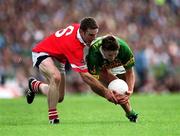 18 June 2000; Maurice Fitzgerald of Kerry in action against Eoghan Sexton of Cork during the Bank of Ireland Munster Senior Football Championship Semi-Final match between Kerry and Cork at Fitzgerald Stadium in Killarney, Kerry. Photo by Brendan Moran/Sportsfile
