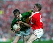 18 June 2000; Mike Frank Russell of Kerry in action against Anthony Lynch of Cork during the Bank of Ireland Munster Senior Football Championship Semi-Final match between Kerry and Cork at Fitzgerald Stadium in Killarney, Kerry. Photo by Brendan Moran/Sportsfile