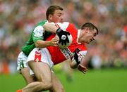 25 June 2000;  Justin McNulty of Armagh in action against Shane King of Fermanagh during the Bank of Ireland Ulster Senior Football Championship Semi-Final match between Armagh and Fermanagh at at St Tiernach's Park in Clones, Monaghan. Photo by David Maher/Sportsfile