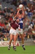 25 June 2000; Padraig Leavy of Westmeath in action against Donal Miller of Laois during the Leinster Minor Football Championship Semi-Final match between Westmeath and Laois at Croke Park in Dublin. Photo by Ray McManus/Sportsfile