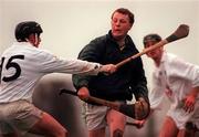 30 January 2000; Pat Fenlon of Carlow in action against Tommy Carter of Kildare during the Keogh Cup match between Kildare and Carlow at Naas GAA Grounds in Kildare. Photo by Damien Eagers/Sportsfile