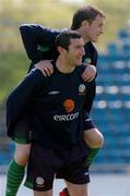 27 April 2004; Alan Quinn gets a lift from team-mate Jason Byrne during a Republic of Ireland training session at WKS Zawisza Stadium in Bydgoszcz, Poland. Photo by David Maher/Sportsfile