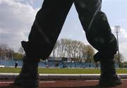 27 April 2004; A view of training through the boots of a security guard during a Republic of Ireland training session at WKS Zawisza Stadium in Bydgoszcz, Poland. Photo by David Maher/Sportsfile