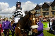 27 April 2004; Moscow Flyer, with Barry Geraghty up, enters the winners enclosure after winning the BETDAQ.com Champion Steeplechase at Punchestown Racecourse in Kildare. Photo by Damien Eagers/Sportsfile