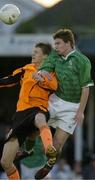 27 April 2004; John Quigley of Republic of Ireland in action against Netherland's Ronald Hikspoors during the U16 International Friendly match between Republic of Ireland and Netherlands at Home Farm FC in Whitehall, Dublin. Photo by Pat Murphy/Sportsfile