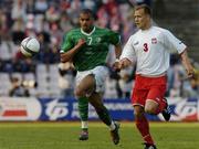 28 April 2004; Steven Reid of Republic of Ireland in action against Arkadiusz Glowacki of Poland during the International Friendly match between Poland and Republic of Ireland at the WKS Zawisza Stadium in Bydgoszcz, Poland. Photo by David Maher/Sportsfile