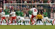 28 April 2004; Republic of Ireland players, from left, Kenny Cunningham, Steven Reid, Liam Miller, John O'Shea, Shay Given and Gary Doherty watch a long range shot from Tomasz Hajto of Poland during the International Friendly match between Poland and Republic of Ireland at the WKS Zawisza Stadium in Bydgoszcz, Poland. Photo by David Maher/Sportsfile