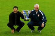 29 April 2004; The 2004 eircom League Cup kicks off on Bank Holiday Monday with holders St. Patrick's Athletic beginning the defence of their title at home to Dublin City. At the announcement of the fixtures with the eircom League Cup trophy are Dublin City manager John Gill, left, and Eamonn Collins, St Patrick's Athletic manager, at Richmond Park in Dublin. Photo by Pat Murphy/Sportsfile