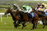 29 April 2004; Cherub (2), with Tony Dobbin up, races away from second place Made In Japan (yellow and blue stripes), with Richard Johnson, on the way to win the Colm McEvoy Auctioneers Champion Four Year Old Hurdle at Punchestown Racecourse in Kildare. Photo by Paul Davis/Sportsfile