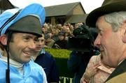 30 April 2004; Jockey Conor O'Dwyer in conversation with trainer Des Hughes after winning the Emo Oil Champion Hurdle, onboard Hardy Eustace, at Punchestown Racecourse in Kildare. Photo by Matt Browne/Sportsfile