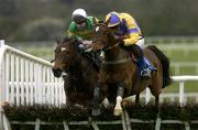 30 April 2004; Sadlers Wings, with Ruby Walsh up, right, jumps the last on their way to winning the Menolly Homes Champion Novice Hurdle, from second placed Kadiskar, with Conor O'Dwyer up, at Punchestown Racecourse in Kildare. Photo by Matt Browne/Sportsfile
