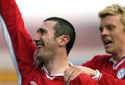 30 April 2004; Jason Byrne celebrates with his Shelbourne team-mate Glen Fitzpatrick, right, after scoring their first goal during the Eircom League Premier Division match between Shelbourne and St Patrick's Athletic at Tolka Park in Dublin. Photo by David Maher/Sportsfile