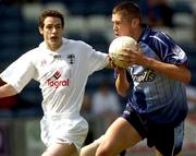 1 May 2004; Declan O'Mahoney of Dublin in action against Mark Dowling of Kildare during the Leinster U21 Football Championship Final Replay between Dublin and Kildare at O'Moore Park in Portlaoise, Laois. Photo by Damien Eagers/Sportsfile