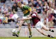 2 May 2004; Colm Cooper of Kerry in action against Michael Comer of Galway during the Allianz National Football League Division 1 Final between Kerry and Galway at Croke Park in Dublin. Photo by David Maher/Sportsfile