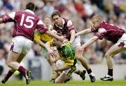 2 May 2004; Seamus Moynihan of Kerry in action against Galway players, from left, Tommy Joyce, 15, Paul Clancy and Michael Comer during the Allianz National Football League Division 1 Final between Kerry and Galway at Croke Park in Dublin. Photo by David Maher/Sportsfile