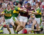 2 May 2004; John Devane of Galway in action against Kerry players, from left, Liam Hassett, Eoin Brosnan and William Kirby during the Allianz National Football League Division 1 Final between Kerry and Galway at Croke Park in Dublin. Photo by Damien Eagers/Sportsfile