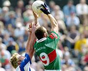 2 May 2004; Ken O'Connor of New York in action against David Brady of Mayo during the Bank of Ireland Connacht Senior Football Championship Quarter-Final match between New York and Mayo at Gaelic Park in The Bronx, New York, USA. Photo by Ray McManus/Sportsfile