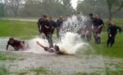 13 June 2000; Players dive in the water on the training pitch during an Ireland Rugby training session at Crusader Park in Oakville, Ontario, Canada. Photo by Matt Browne/Sportsfile