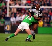 28 May 2000; Jonah Lomu of Barbarians is tackled by Shane Horgan of Ireland during the Rugby International match between Ireland XV and Barbarians at Lansdowne Road in Dublin. Photo by Aoife Rice/Sportsfile