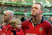 27 May 2000; Munster captain Mick Galwey watches the presentation of the cup with his daughter Neassa and Keith Wood, left, following defeat in the Heineken Cup Final between Munster and Northampton Saints at Twickenham Stadium in London, England. Photo by Brendan Moran/Sportsfile