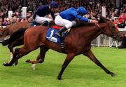 27 May 2000; Bachir, with Frankie Dettori up, 1, on their way to winning the Entenmann's Irish 2,000 Guineas from eventual second place Giant's Causeway, with Mick Kinane up, left, at the Curragh Racecourse in Kildare. Photo by Sportsfile