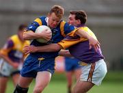 20 May 2000; Kevin O'Brien of Wicklow in action against Colm Morris of Wexford during the Bank of Ireland Leinster Senior Football Championship Group Stage Round 3 match between Wicklow and Wexford at Aughrim County Ground in Aughrim, Wicklow. Photo by Matt Browne/Sportsfile