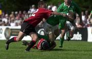 17 June 2000; Kevin Maggs of Ireland is tackled by Mark Irvine, 12, and Scott Stewart of Canada during the Rugby International match between Canada and Ireland at Fletcher's Fields in Markham, Ontario, Canada. Photo by Matt Browne/Sportsfile