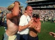 6 August 1995; Clare manager Ger Loughnane celebrates with supporters following their victory in the Guinness All-Ireland Senior Hurling Championship Semi-Final match between Clare and Galway at Croke Park in Dublin. Photo by David Maher/Sportsfile