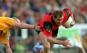 28 May 2000; Mickey Linden of Down in action against Anto Finnegan of Antrim during the Bank of Ireland Ulster Senior Football Championship Quarter-Final match between Antrim and Down at Casement Park in Belfast, Antrim. Photo by David Maher/Sportsfile