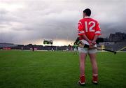 27 May 2000; Cork's Neil Ronan stands for the National Anthem, Amhrán na bhFiann, prior to the Guinness Munster Senior Hurling Championship Quarter-Final match between Kerry and Cork at Fitzgerald Stadium in Killareny, Kerry. Photo by Ray Lohan/Sportsfile