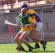 18 June 2000; John Troy of Offaly in action against Jason Lawlor of Wexford during the Guinness Leinster Senior Hurling Championship Semi-Final match between Offaly and Wexford at Croke Park in Dublin. Photo by Aoife Rice/Sportsfile