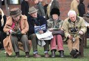 14 March 2008; Punters examine the form ahead of the day's racing. Cheltenham Racing Festival, Prestbury Park, Cheltenham, England. Picture credit; Stephen McCarthy / SPORTSFILE