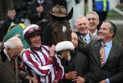 14 March 2008; Jockey David Russell and winning connections celebrate after they sent out Tiger Cry to win the Johnny Henderson Grand Annual Steeple Chase Challenge Cup. Cheltenham Racing Festival, Prestbury Park, Cheltenham, England. Picture credit; Stephen McCarthy / SPORTSFILE