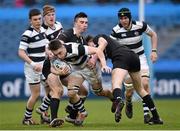 17 March 2015; Max Kearney, Belvedere College, is tackled by Tim Foley, left, and Rob Wharton, CC Roscrea. Bank of Ireland Leinster Schools Senior Cup Final, in association with Beauchamps Solicitors, Belvedere College v Cistercian College Roscrea. RDS, Ballsbridge, Dublin. Picture credit: Stephen McCarthy / SPORTSFILE
